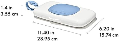 Lifestyle view of OXO Tot Dusk wipes dispenser inside a diaper bag
