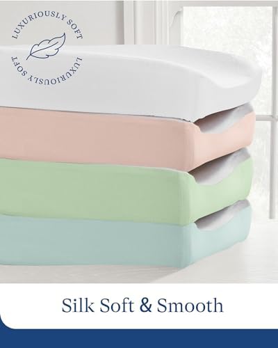 Close up view of the hypoallergenic sateen weave texture on the baby changing sheet.