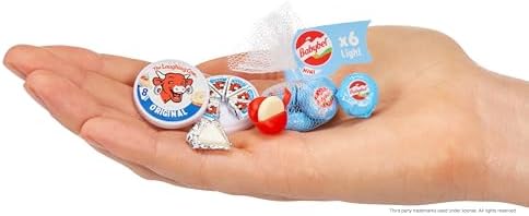 MGA's Miniverse capsule capsule shell being used as a display stand for tiny groceries.