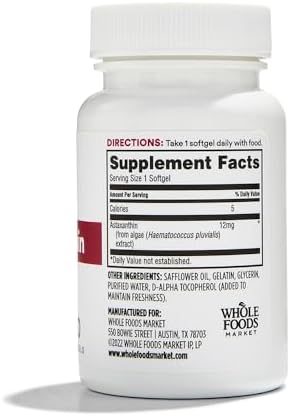 Side angle of Whole Foods Market Astaxanthin 12mg supplement bottle showing ingredient facts and soy allergen warning.