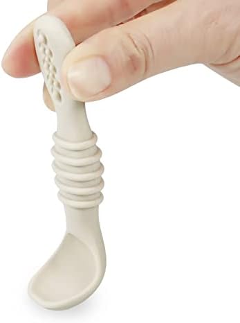 Shallow bowl design of the PandaEar baby led weaning spoon showing portion control features for safety