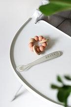 Béaba food grade silicone baby spoons demonstrating high flexibility and softness