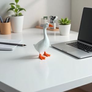 Tqgok 7 inch resin goose figurine on office desk