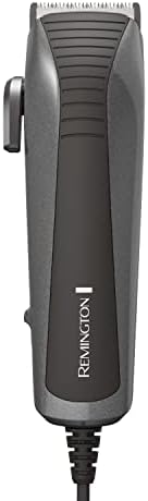 Remington HC4060 clipper unboxed with its full set of five tapered fade combs and nine standard guide combs.