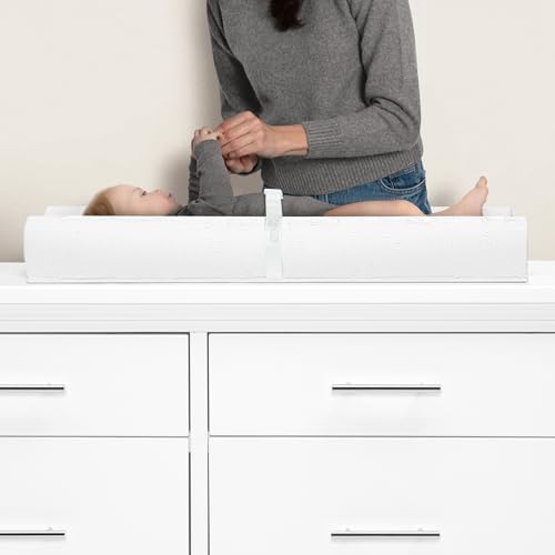 Serta changing pad with waterproof white vinyl surface