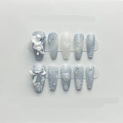 ZIIVIEVS long blue press on nails close up layout highlighting bowknot flower details