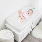Biloban baby changing table sheet in nursery setting