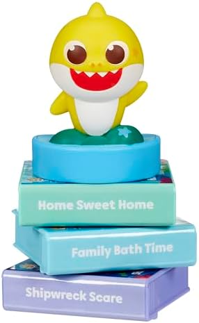 Baby Shark character figurine sitting on top of the story machine activating colorful nightlight effects.