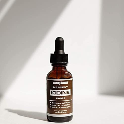 Close up of the glass dropper cap on the Nascent Iodine supplement bottle demonstrating the easy dosage control mechanism.
