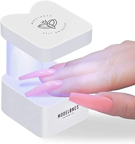 Modelones portable nail dryer showing USB power connection