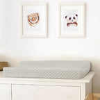 Nivava Baby nursery changing pad sheet lifestyle packaging view.