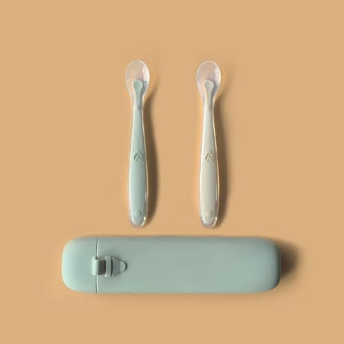 Little Rawr premium imported baby weaning kit featuring two green food grade silicone spoons side by side on a clean background.