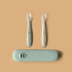 Little Rawr premium imported baby weaning kit featuring two green food grade silicone spoons side by side on a clean background.