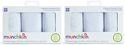 Machine washable Munchkin infant diaper changing pad liners being prepared for laundry cleaning