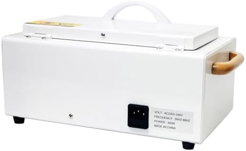 Close up of Smedent sterilizer handle and lid locking mechanism