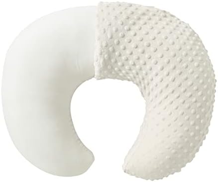 Baby using nursing pillow with beige cover for support