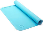 Munchkin Spotless two piece placemat set laid out flat showcasing the complete product packaging.