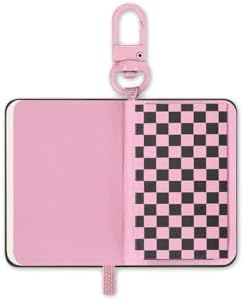 Moleskine x Blackpink notebook charm attached to a bag as an accessory.