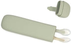 Close up of the soft flexible green tip on the Little Rawr infant self feeding training utensil showing its gentle texture.