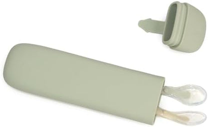 Close up of the soft flexible green tip on the Little Rawr infant self feeding training utensil showing its gentle texture.