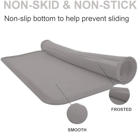 Waterproof food grade silicone placemat for children being cleaned in a kitchen sink
