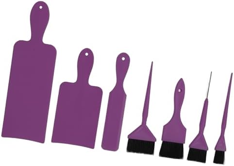 Close up of professional hair dye paddle board and brushes
