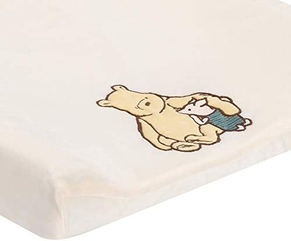 Close up view of the soft creamy white minky fabric texture on the Lambs and Ivy diaper changing mat cover