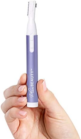 Plum Beauty 3900slb compact body grooming device with extra fine blade attachment.