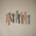 Mushie toddler learning spoons pack in authentic retail packaging