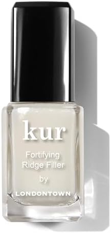 Londontown nail smoothing primer base coat on uneven fingernails showing self leveling effect