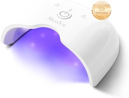 MelodySusie rechargeable portable LED UV light being used to cure a gel manicure.