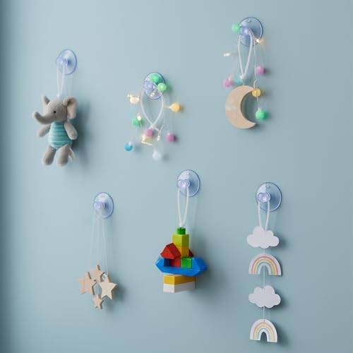 Multi purpose clear suction cups being used for home cable management.