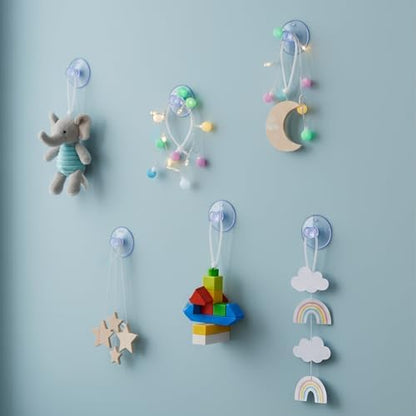 Multi purpose clear suction cups being used for home cable management.