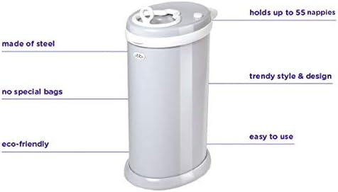 Ubbi pink diaper disposal pail displayed in modern nursery setting