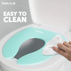 Jool Baby compact travel toilet training ring tucked inside a backpack