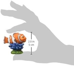 Penn-Plax Disney licensed Nemo resin fish tank decoration inside a small desktop freshwater setup.