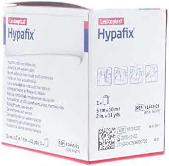 Breathable non woven adhesive sheet roll for securing catheters and tubing
