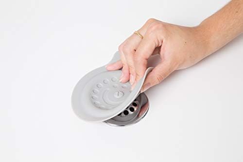 Ubbi drain stopper demonstrating the flexible silicone material