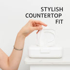 Loo flushable wipes dispenser in modern bathroom setting