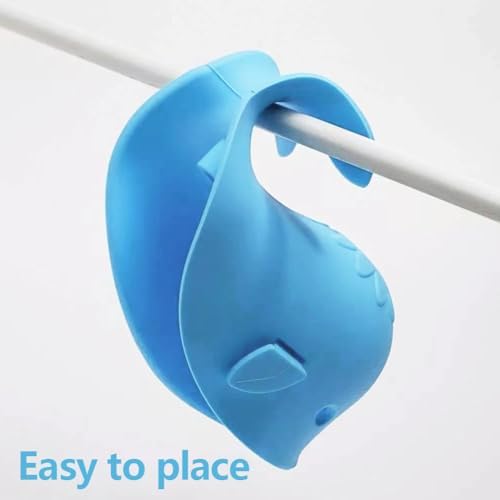 Childproof silicone tub safety toy being rinsed under water.