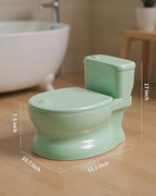 PipNest toddler potty trainer with lid open showing inner bowl