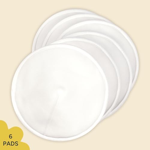 Breastfeeding mother using leak-proof bamboo nursing pads