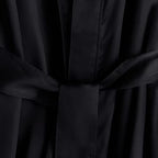 Client wearing Wuweot salon robe for haircutting