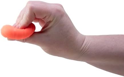 An adult hand squeezing a one point five inch sports themed thermoplastic rubber fidget ball