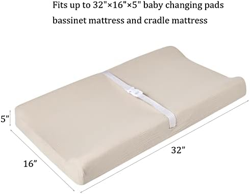 QUENESS neutral fitted baby bedding showing elasticized deep pocket corners