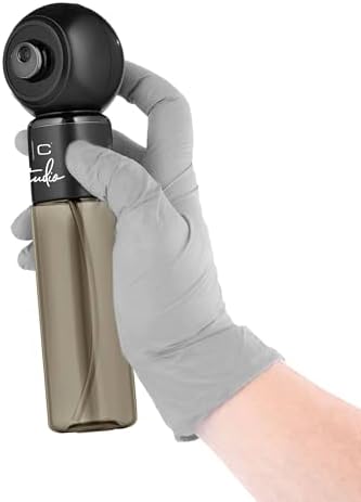 StyleCraft Studio Grooming Spray producing an ultra fine atomized mist cloud