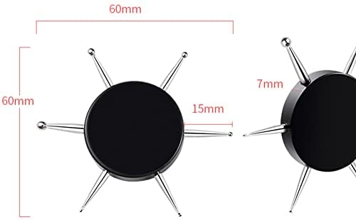 Demonstration of the varying sizes of metal tips creating distinct dot patterns for nail art.