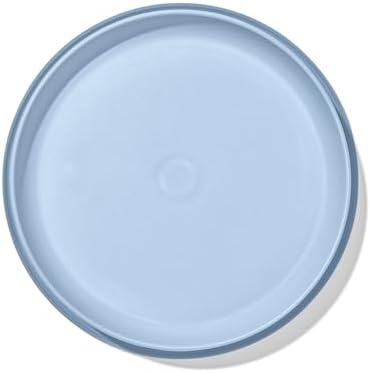 OXO Tot suction plate demonstrating secure grip on high chair tray