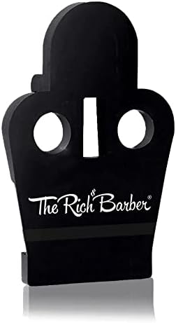 Barber using The Rich Barber blade setter for trimmer alignment