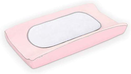 Three white Munchkin changing pad liners stacked together